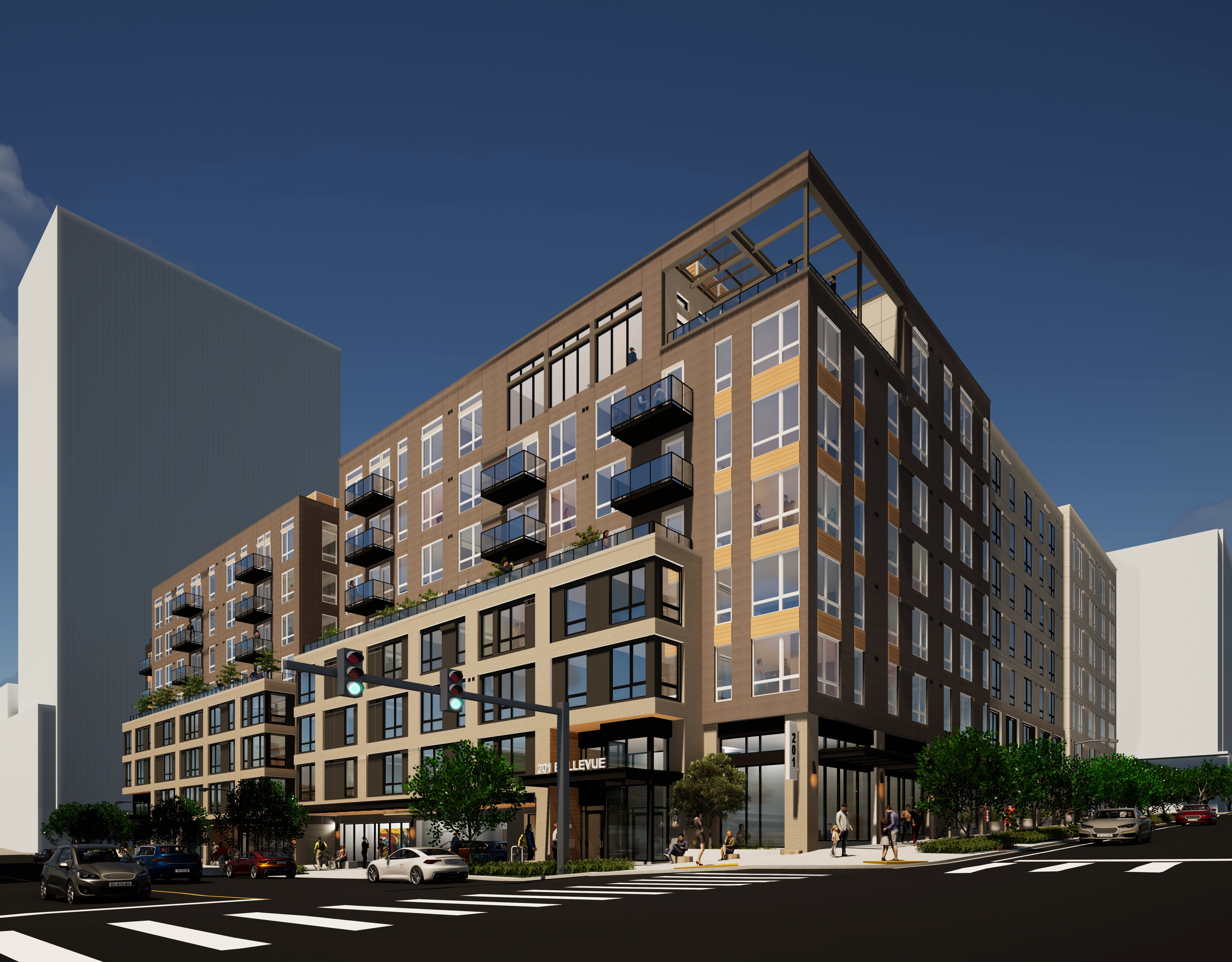 A modern multi-story apartment building with balconies, featuring a brick and glass facade. The structure is set in an urban environment with street view and greenery around.