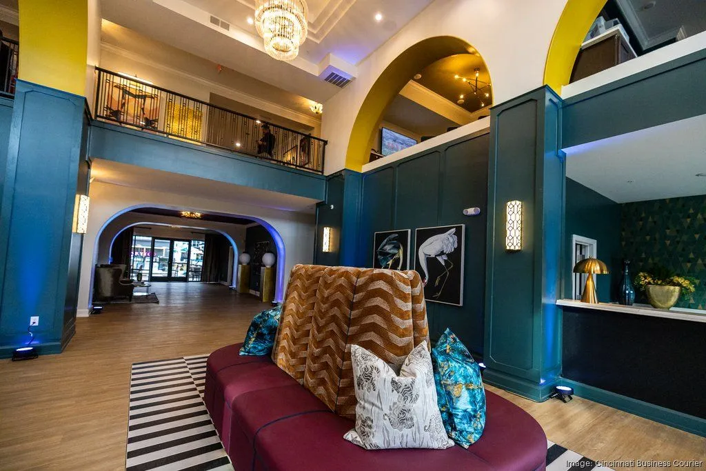 A stylish lobby area with a colorful seating arrangement and elegant decor.