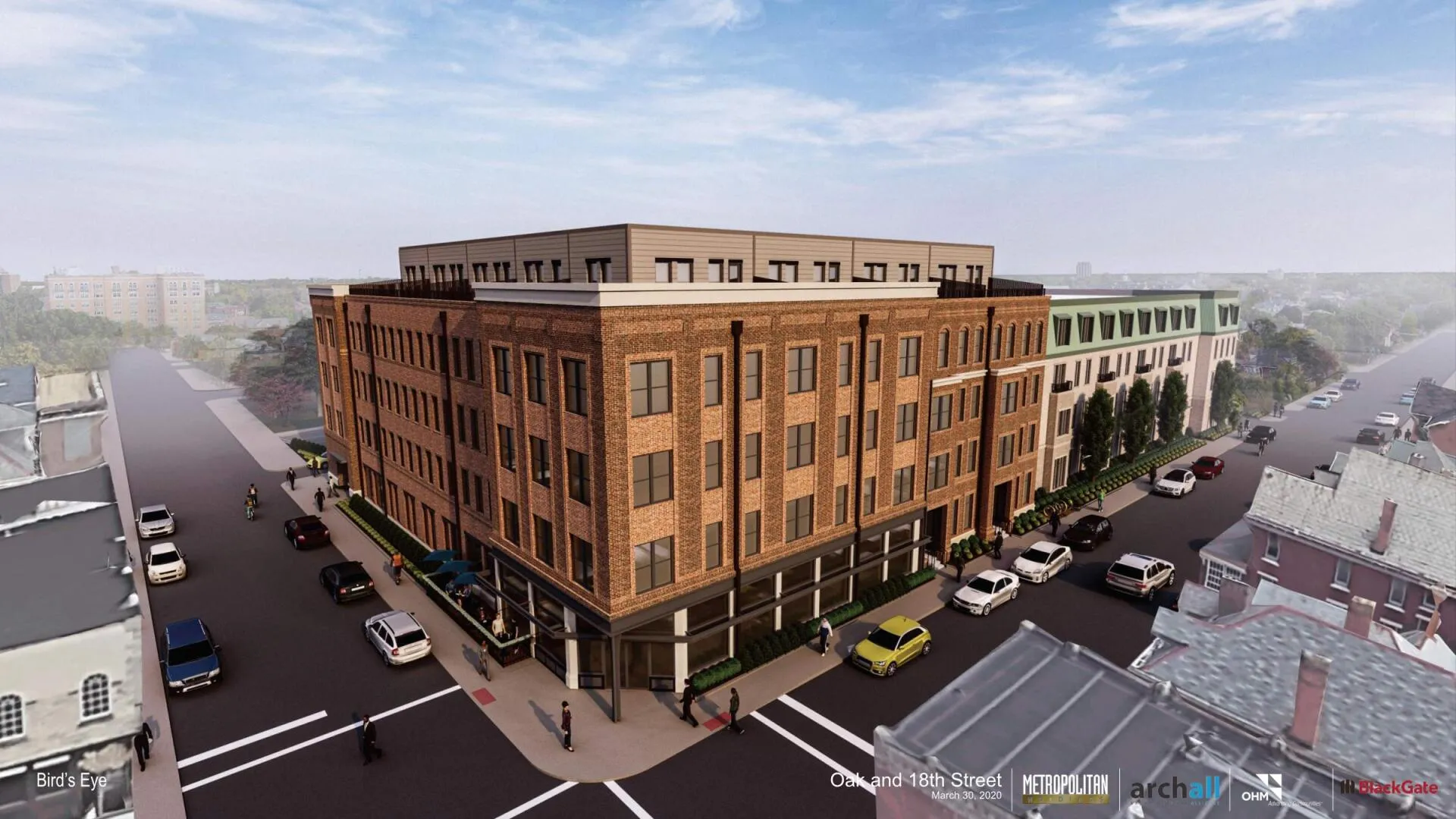 Architectural rendering of a new building at the corner of a street intersection, showcasing a brick facade and multiple stories.