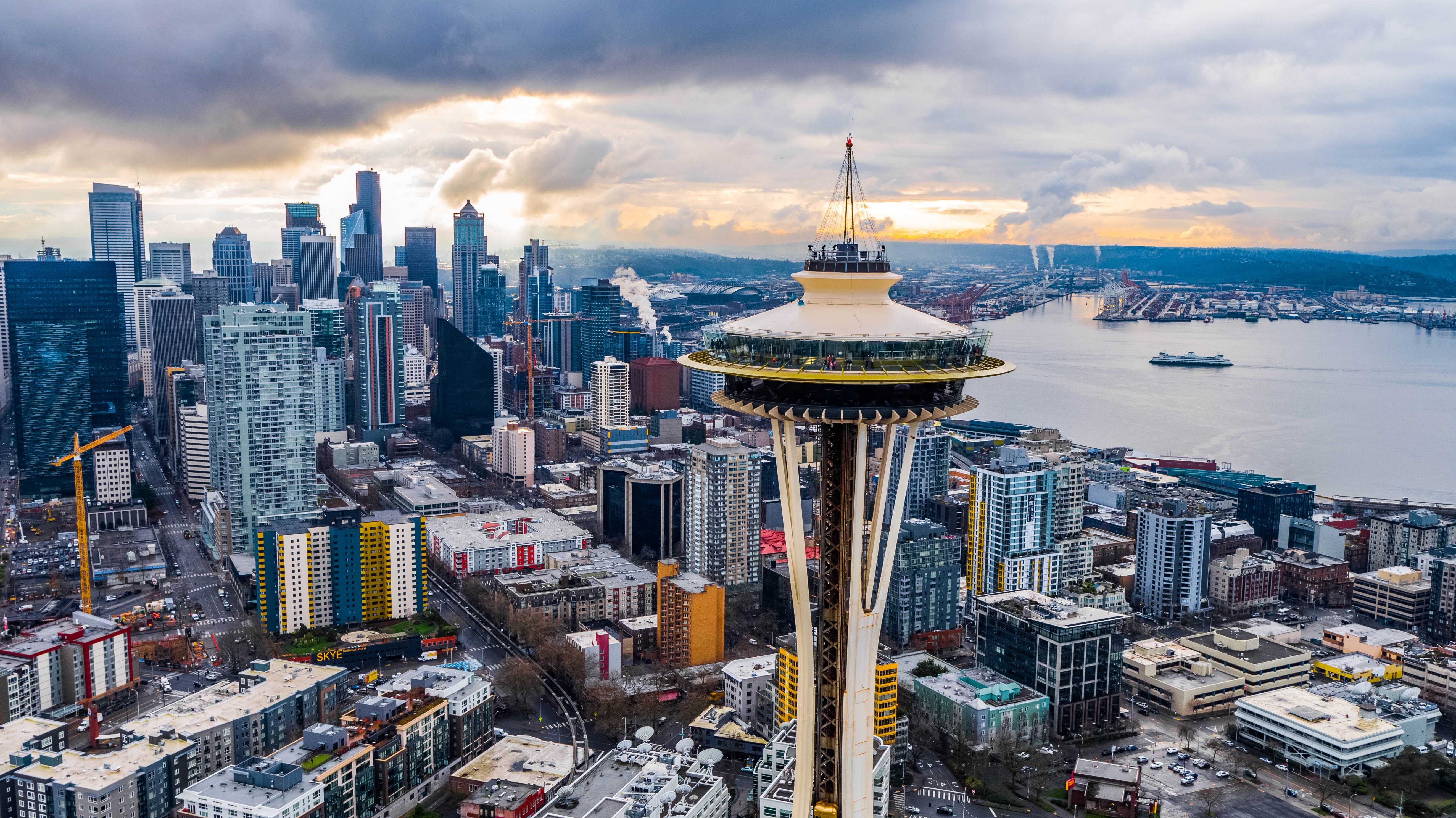 Aerial view of Seattle skyline featuring the Space Needle and waterfront.
