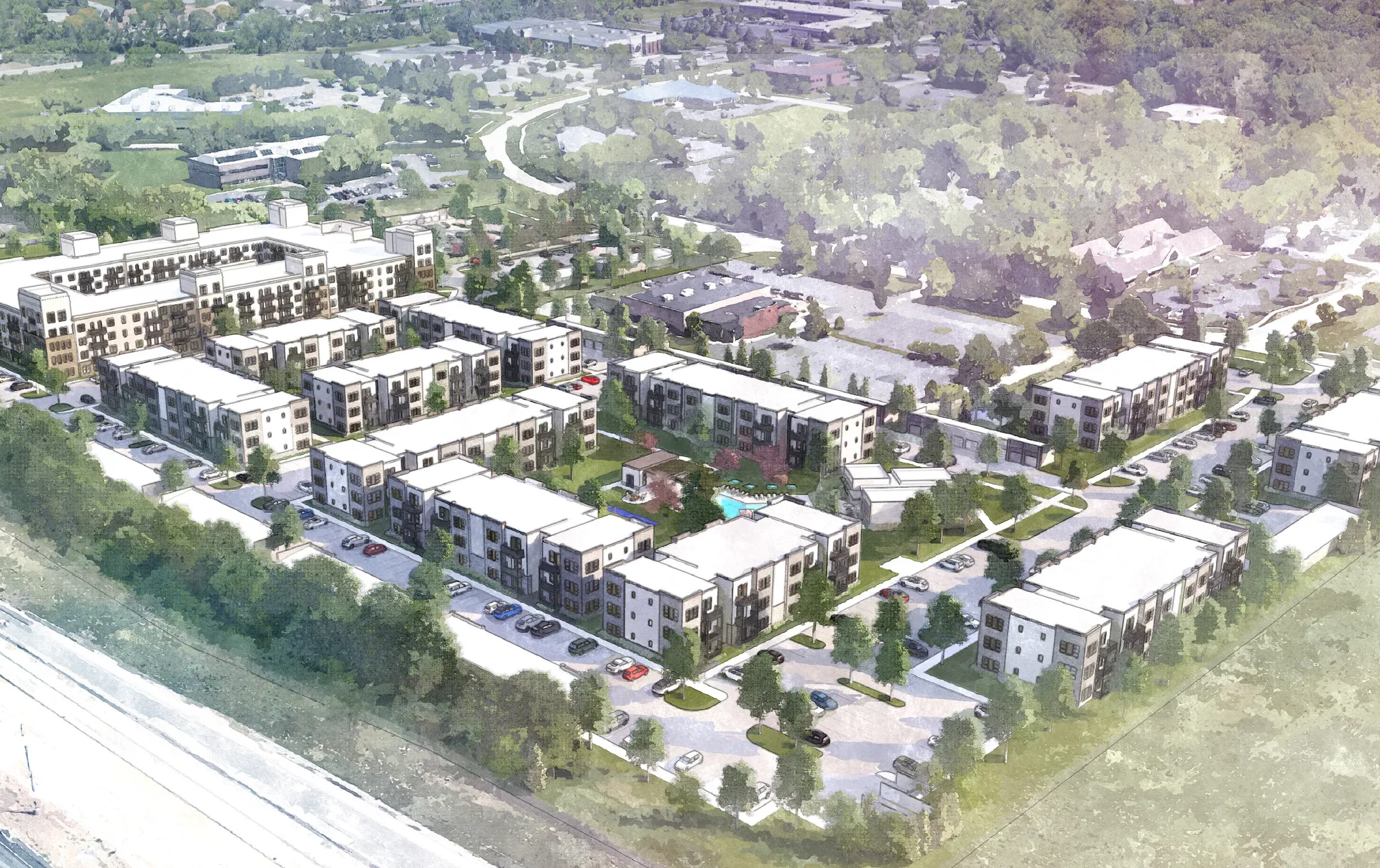 Aerial view of a large apartment complex surrounded by greenery and pathways.