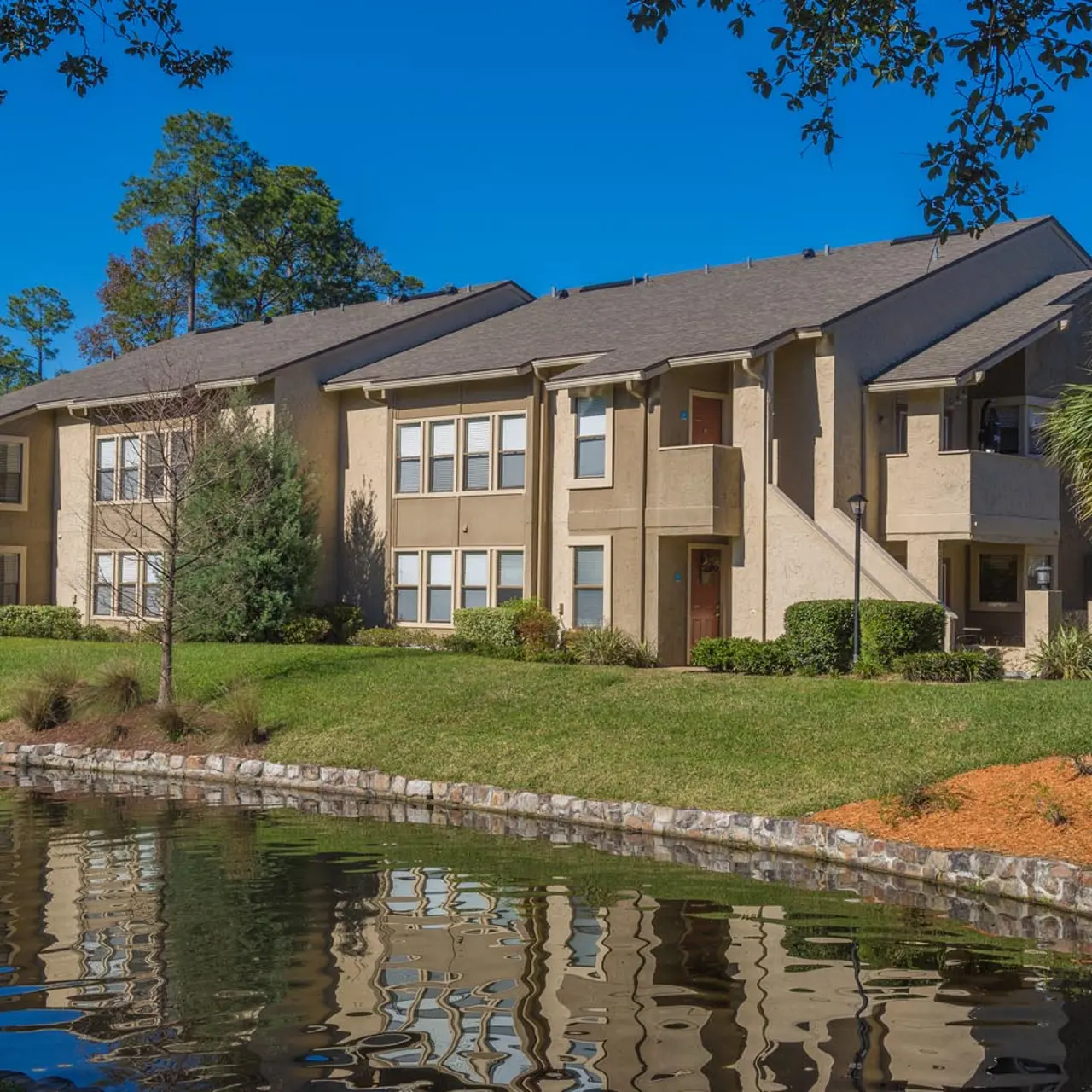 exterior of the property overlooking the pond