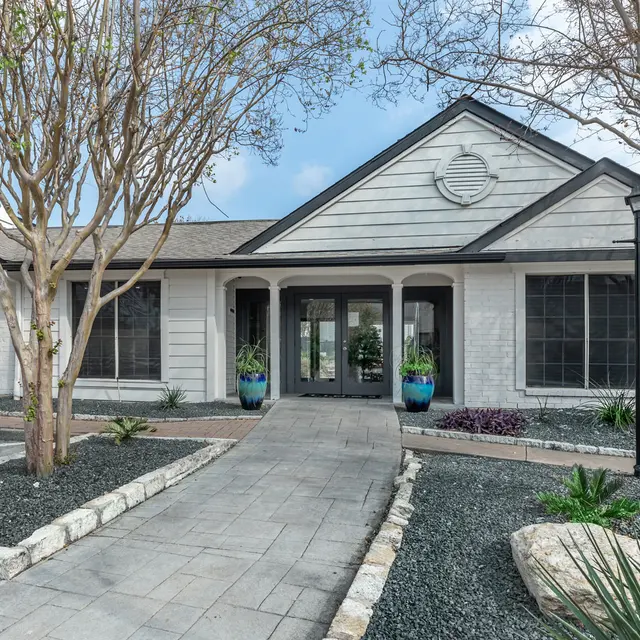 Walkway and entrance to the main office at Aviva at North Plaza 