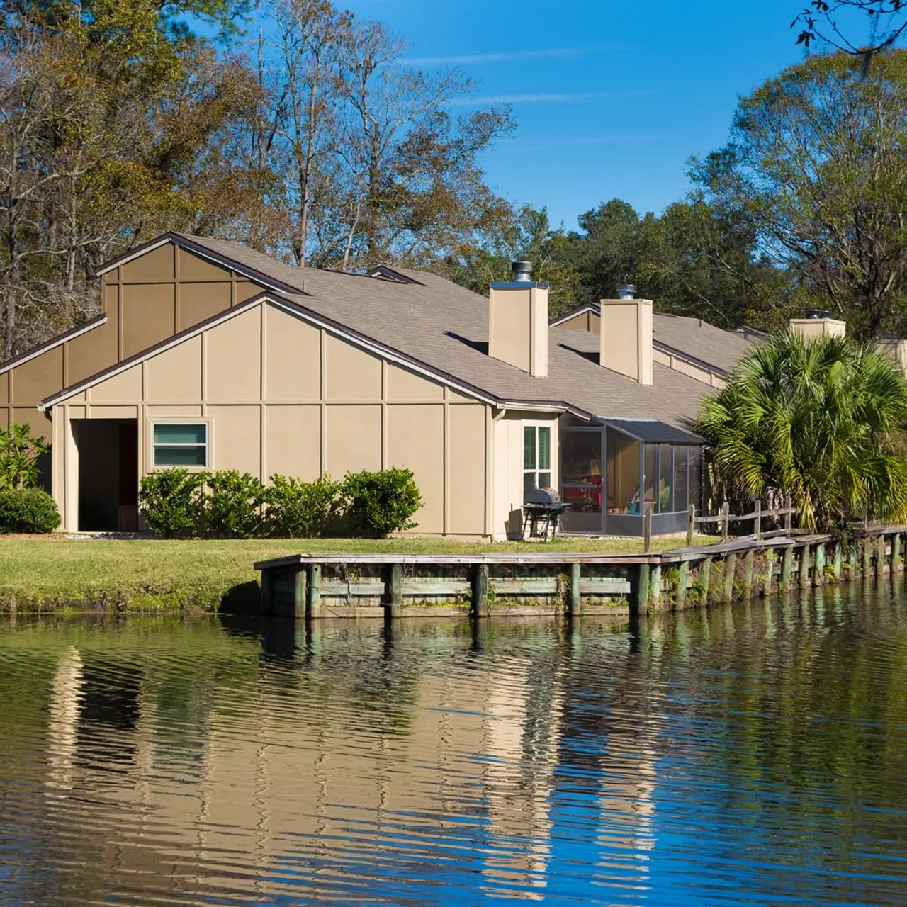 exterior of the property overlooking the pond