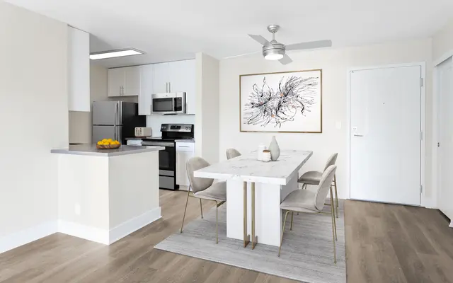 15Fifty5 - kitchen, dining room, chairs, table, ceiling fan, refrigerator, microwave, stove/oven, rug