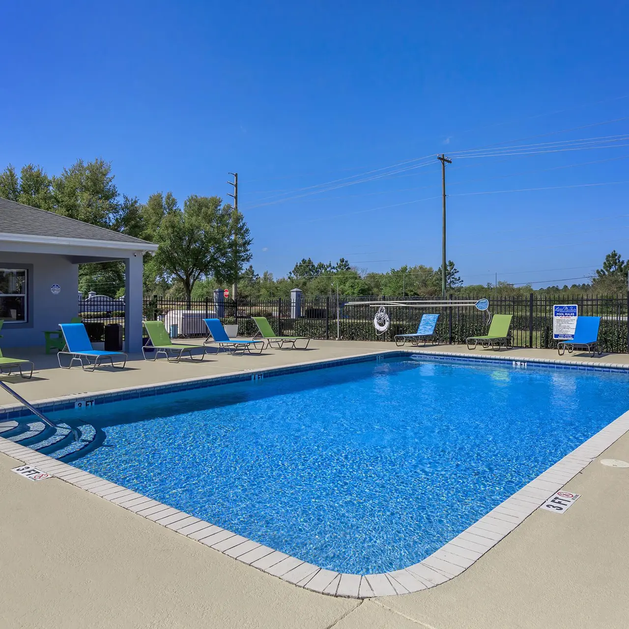 large pool with lounge chairs