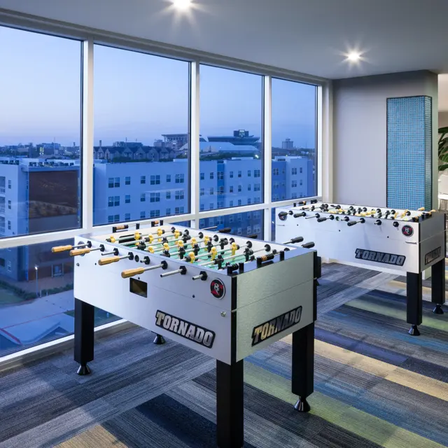 One Bedroom Student Apartments in College Station TX | Park West | Game Room Featuring Foosball Tables and Beautiful City Views