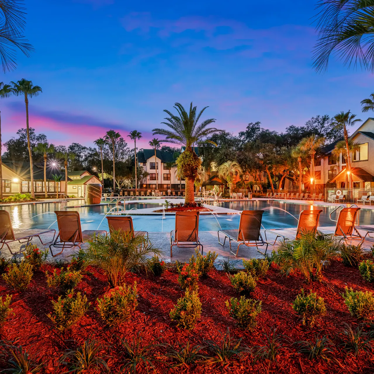 beautiful landscaping around the swimming pool