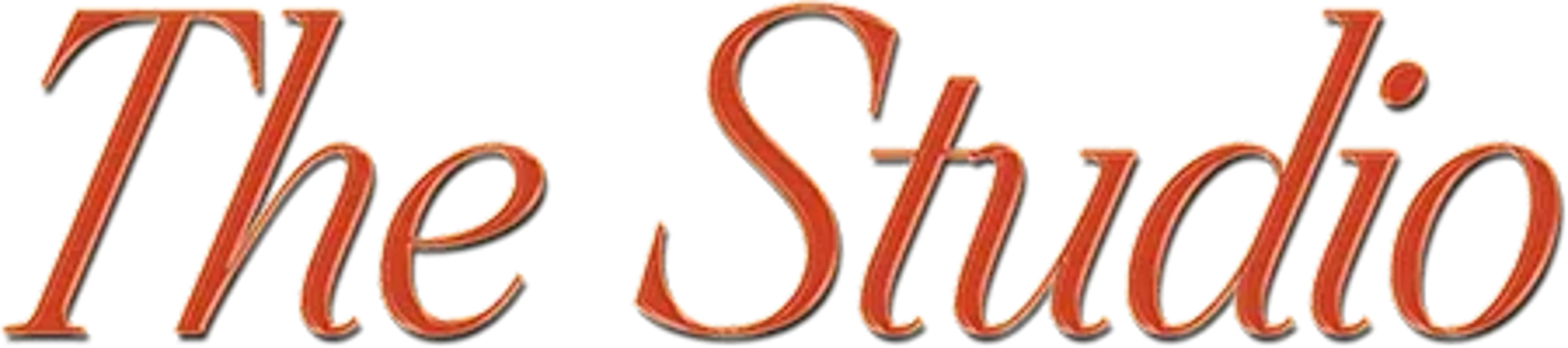 The Studio at Maple & Ash Text graphic displaying 'The Studio' in an elegant, cursive font with an orange hue.