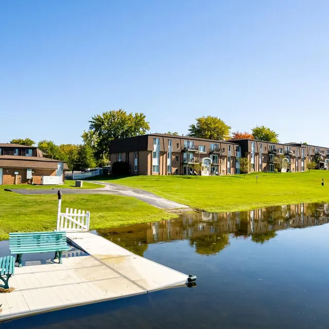 Greens Lake Apartments - Exterior Lakefront View