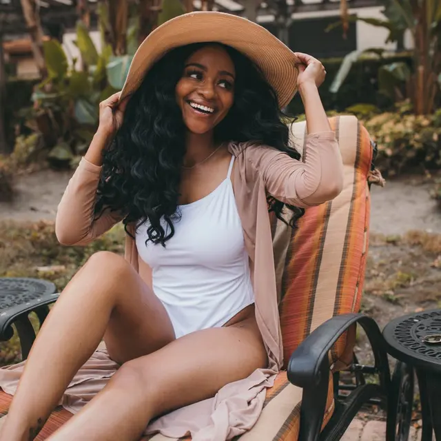 The Rowe at Gate 1 - Pool Bench The Rowe at Gate 1 - Girl, Chair