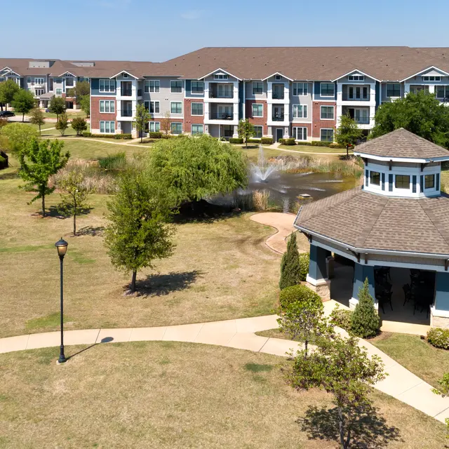 Centreport Lake Sky view of Centreport Lake buildings, gazebo, lake and open grass with walkways.
