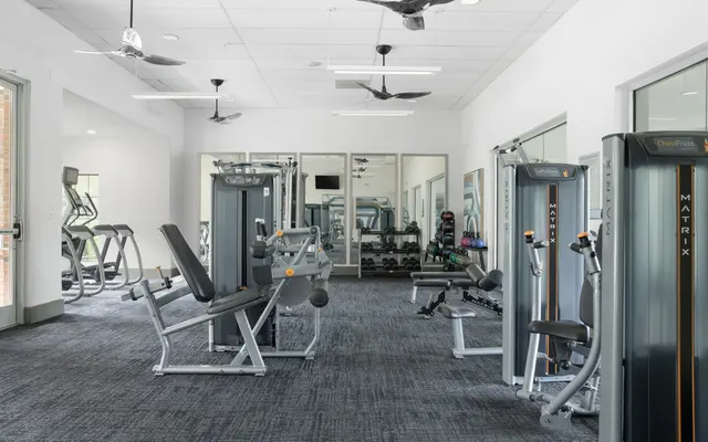 South Charlotte apartments interior photo of the fitness center - Ceiling Fan, Electrical Device, Appliance