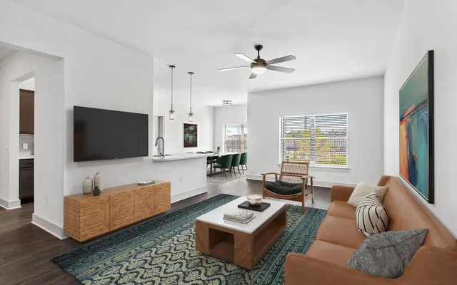 living room and dining room area with TV, ceiling fan with painted white walls - Living Room, Room, Indoors