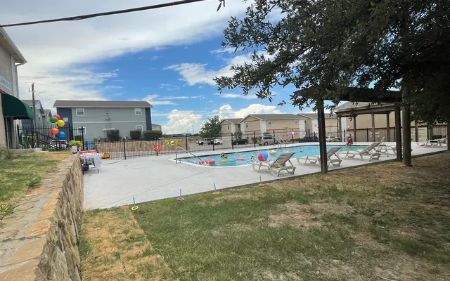 The Ridge and Parkdale Apartments - Chair, Person, Car