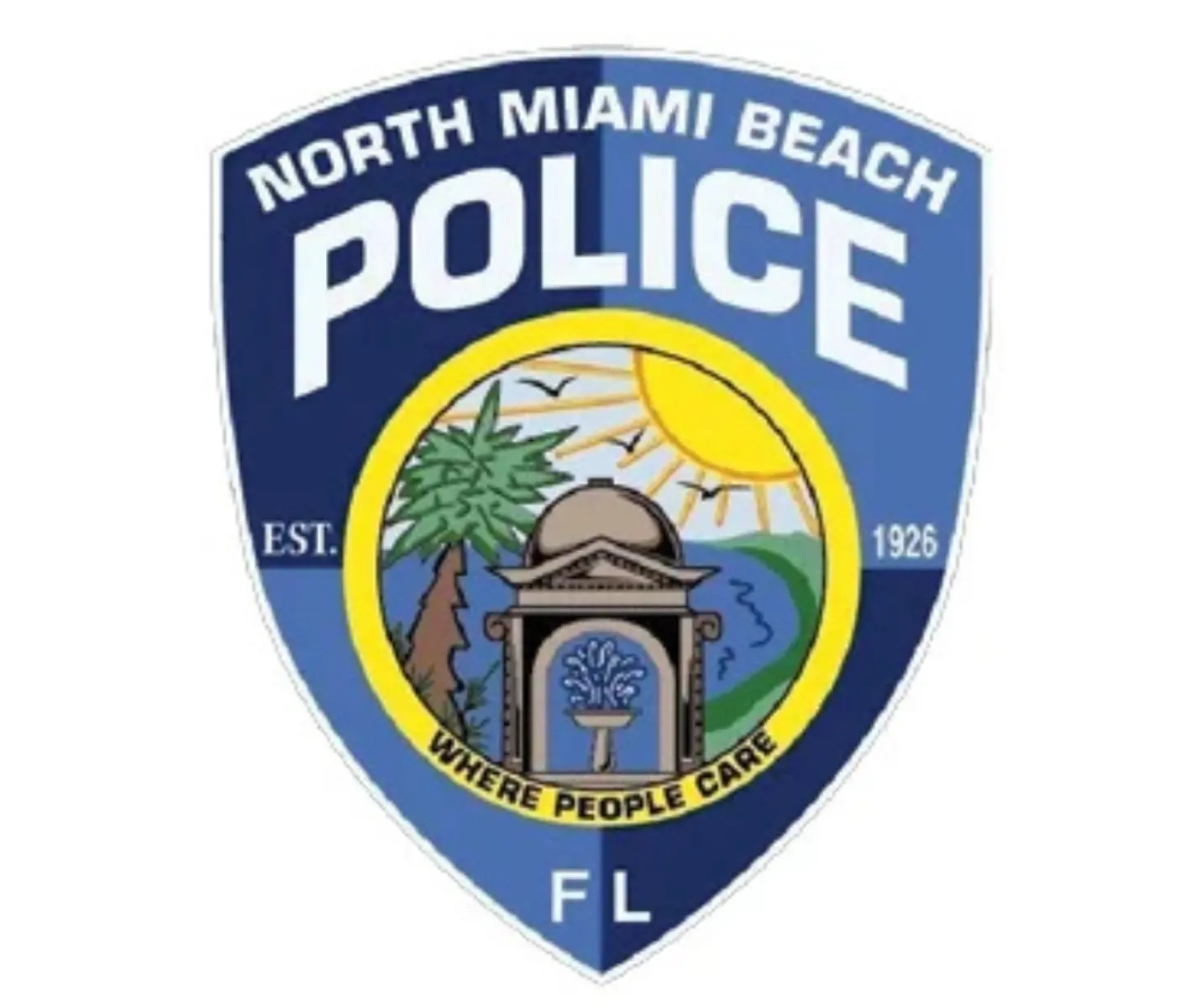 Logo of the North Miami Beach Police Department featuring a shield with a sun, trees, and a decorative structure.