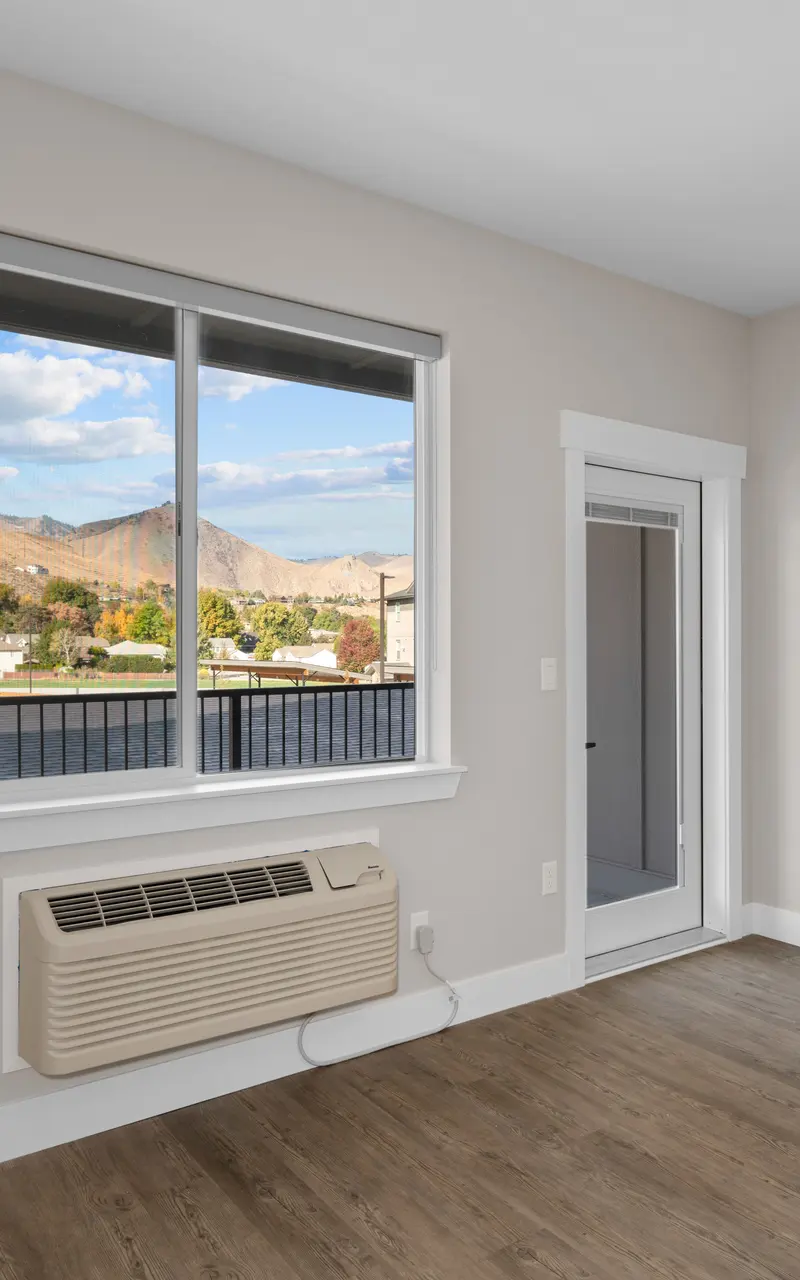 Apartment showcasing breathtaking views of tranquil natural scenery, offering a serene and scenic living experience