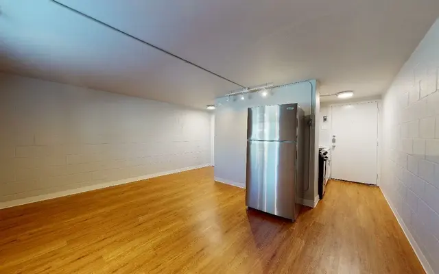 Dove Tree Apartments - Living Room, Flooring, Wood, Door