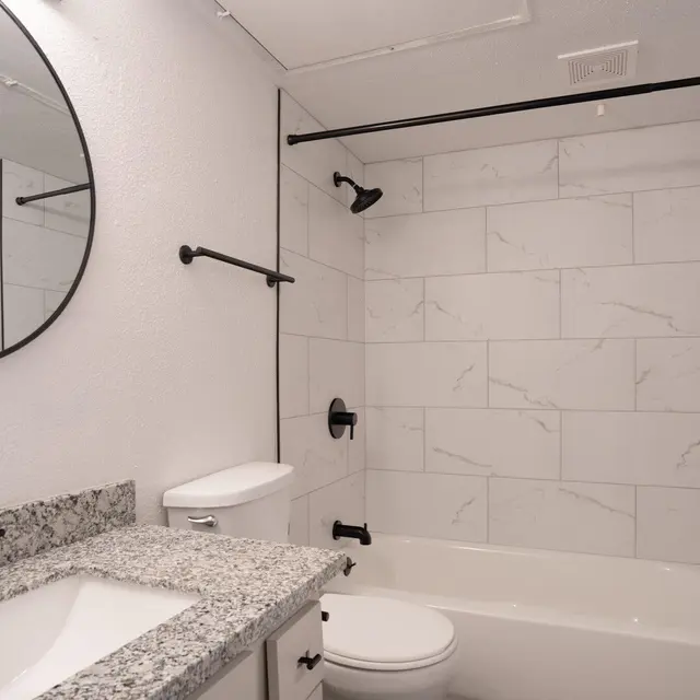 Skylar Pointe Apartments and Townhomes - Bathroom, Indoors, Shower Faucet