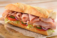 Sub deli sandwich with meat and veggies 