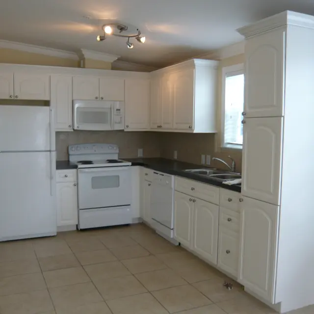 Flagler Village Apartments - Indoors, Kitchen, Microwave