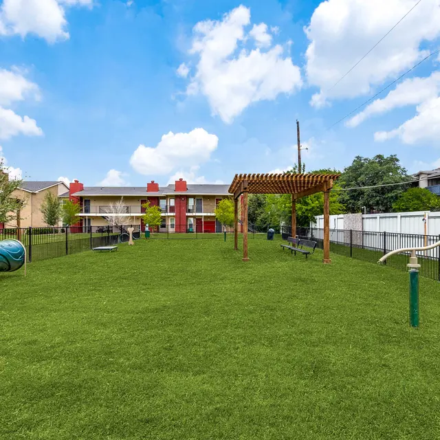 Dog park at North Star Apartments with obstacle course in Dallas, TX