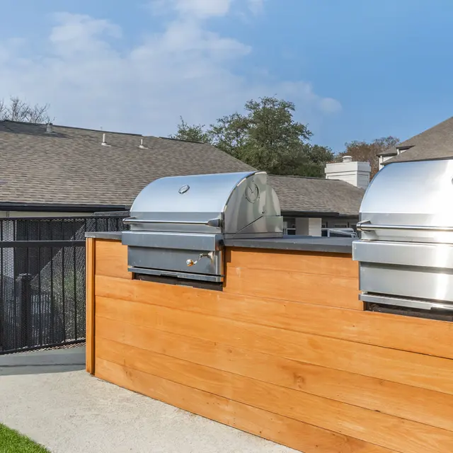Grilling station with countertops in the courtyard at Aviva at North Plaza