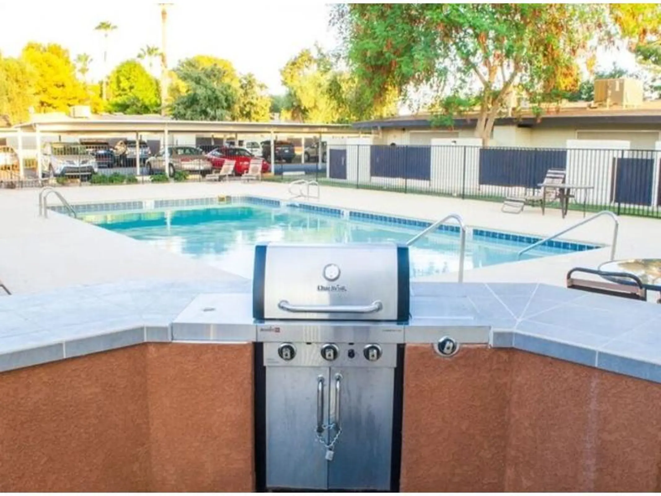 Built-in grill and counter beside the swimming pool.