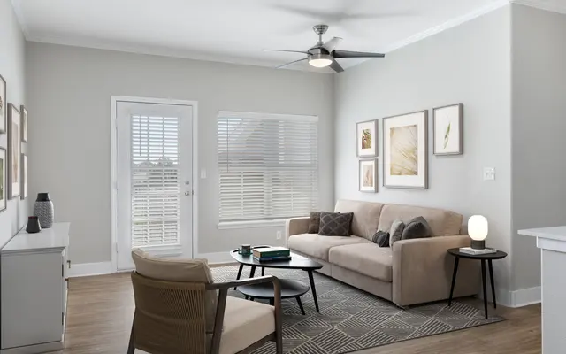 living room interior with white painted walls and ceiling, hardwood floors - Home Decor, Ceiling Fan, Table
