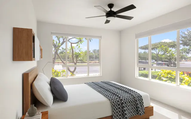 bedroom with wide windows, white walled paint and ceiling fan at apartments in Kapolei, HI - Ceiling Fan, Appliance, Bedroom