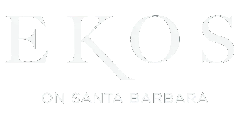 Logo for Ekos on Santa Barbara featuring the name in white with a distinctive slant on the 'K'