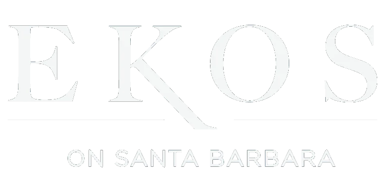 Ekos on Santa Barbara Logo Logo for Ekos on Santa Barbara featuring the name in white with a distinctive slant on the 'K'