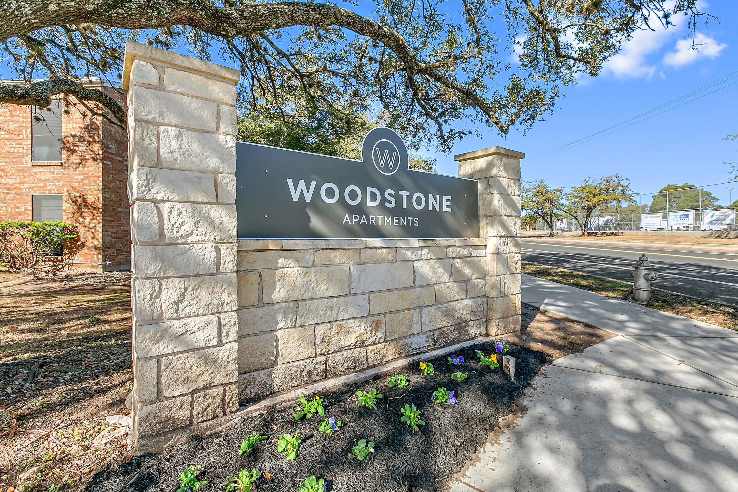 Woodstone Apartments - Signage, Path, Road