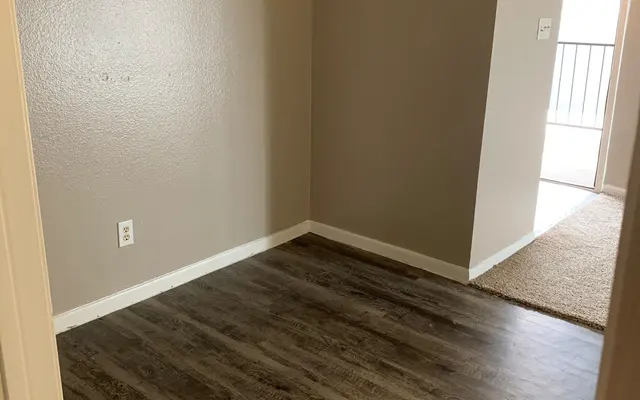 Tradewinds Apartments - Rug, Wood, Floor