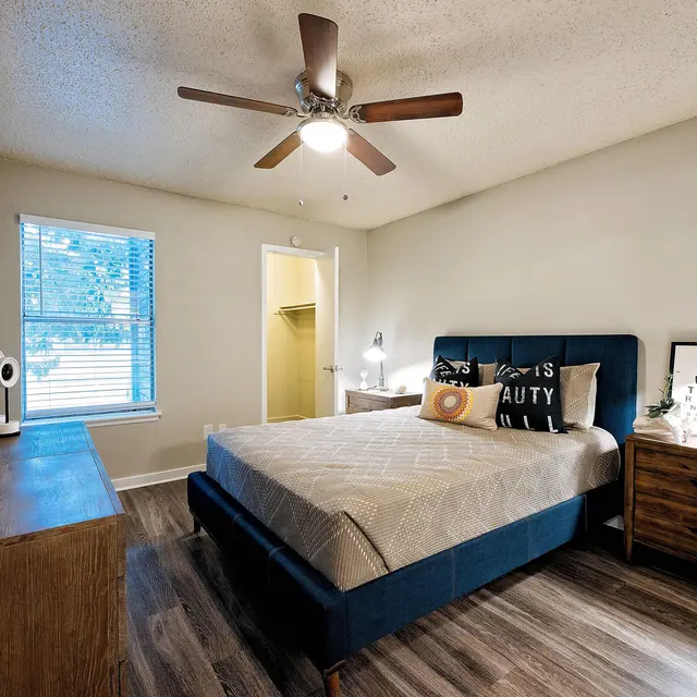 Artisan at South Lamar Furnished bathroom with large vanity mirror, tub, and overhead lighting at Artisan at South Lamar in Austin, TX