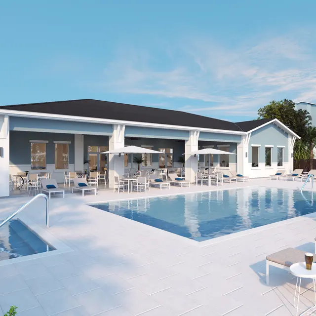 A modern pool area featuring a large pool with lounge chairs, umbrellas, and a spa section, surrounded by palm trees and a contemporary building.