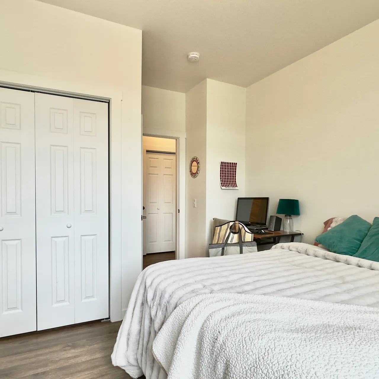 apartment large bedroom, apartment primary bedroom Primary bedroom in a furnished apartment, showcasing stylish decor and comfortable furnishings