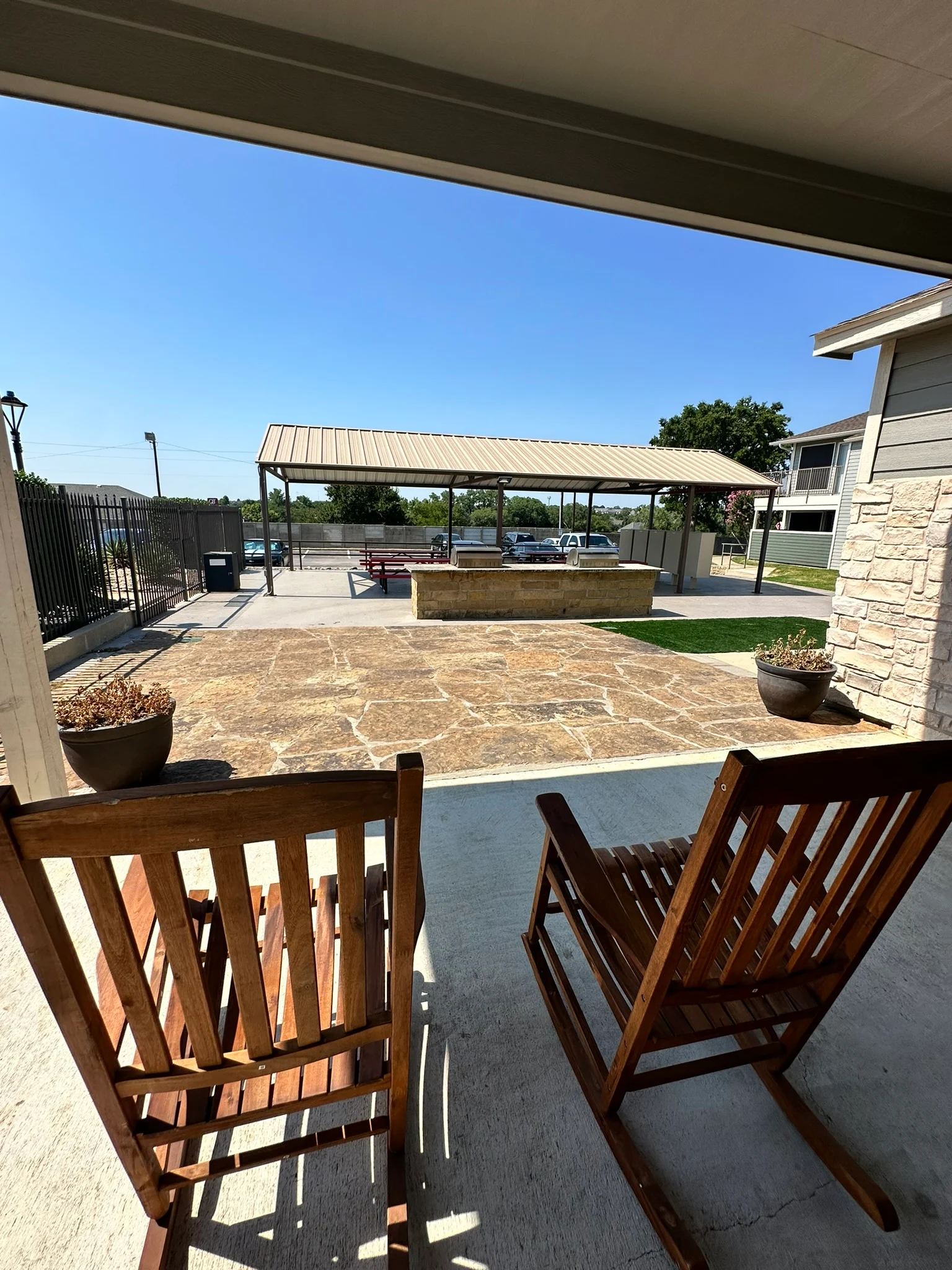 Autumn Breeze Apartments - Floor, Plant, Chair
