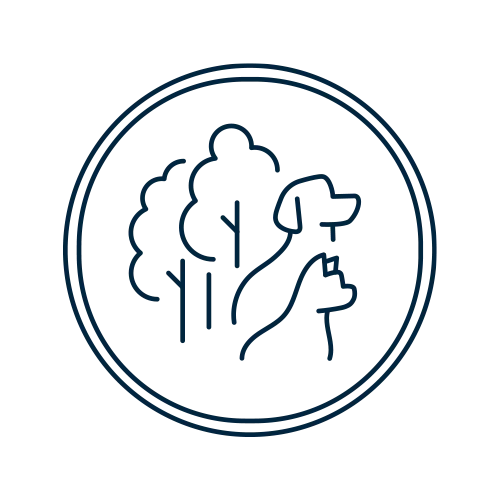 Icon of a dog and a tree within a circular shape.