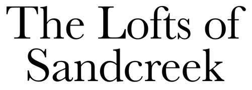 Text graphic featuring 'The Lofts of Sandcreek' in a stylish font