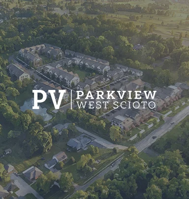 Aerial view of a community featuring residential buildings and greenery, with the text 'PV Parkview West Scioto' overlaying the image.