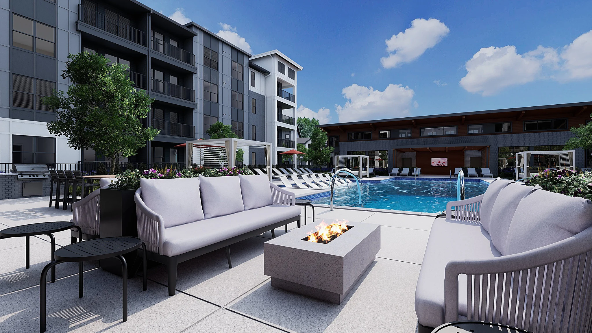 A modern outdoor area featuring a swimming pool, lounge chairs, and comfortable seating around a fire pit.