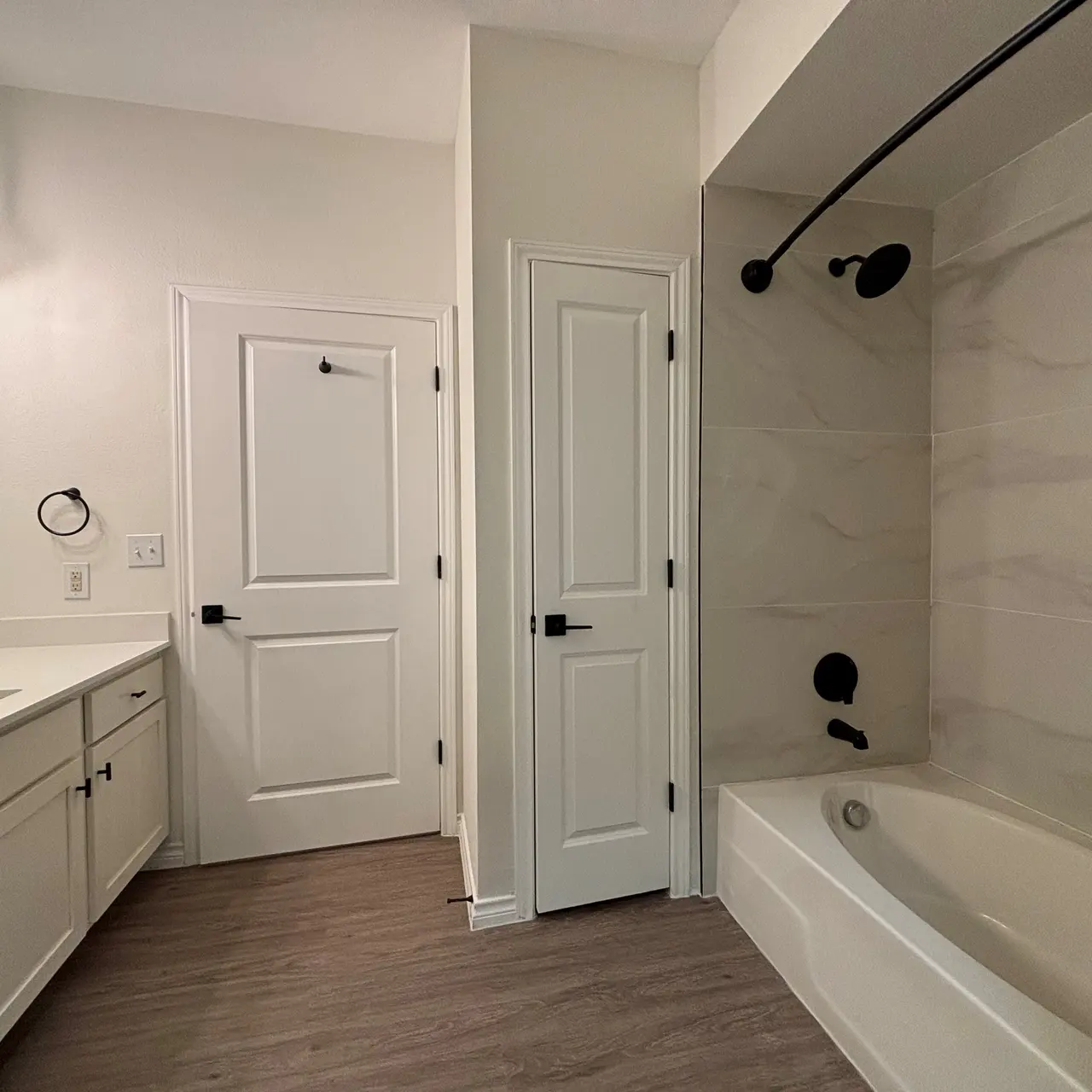 SYNC at Nobu Station - Elite Bathroom upgrades include sleek Cabinets, updated Lighting, and stunning Tilework. 