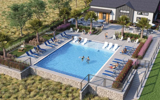 Modern Swimming Pool and Clubhouse A modern swimming pool area with lounge chairs and palm trees, surrounded by landscaped gardens and a club house in an outdoor setting.