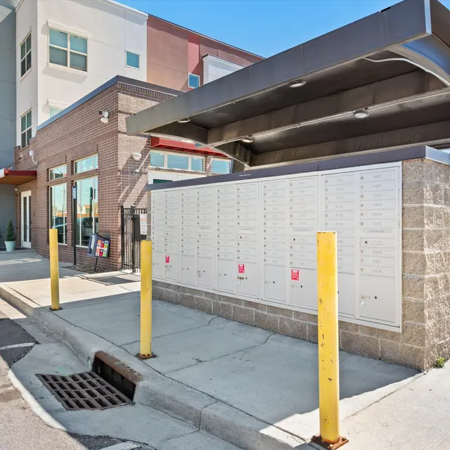 Mailboxes with camera surveillance at Baker School Apartments.