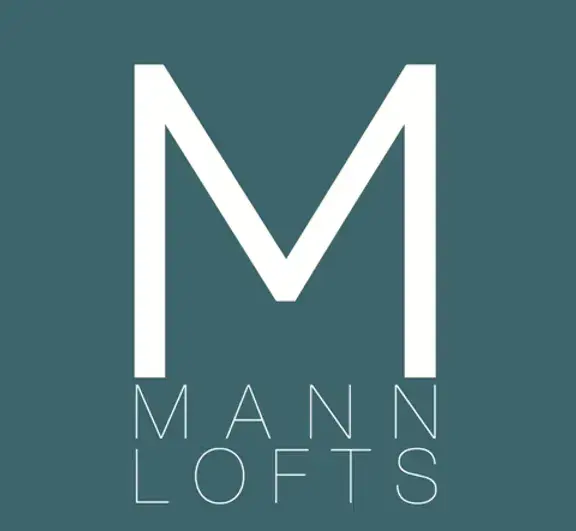 Logo design featuring the letter 'M' alongside the words 'MANN LOFTS' in a modern font.