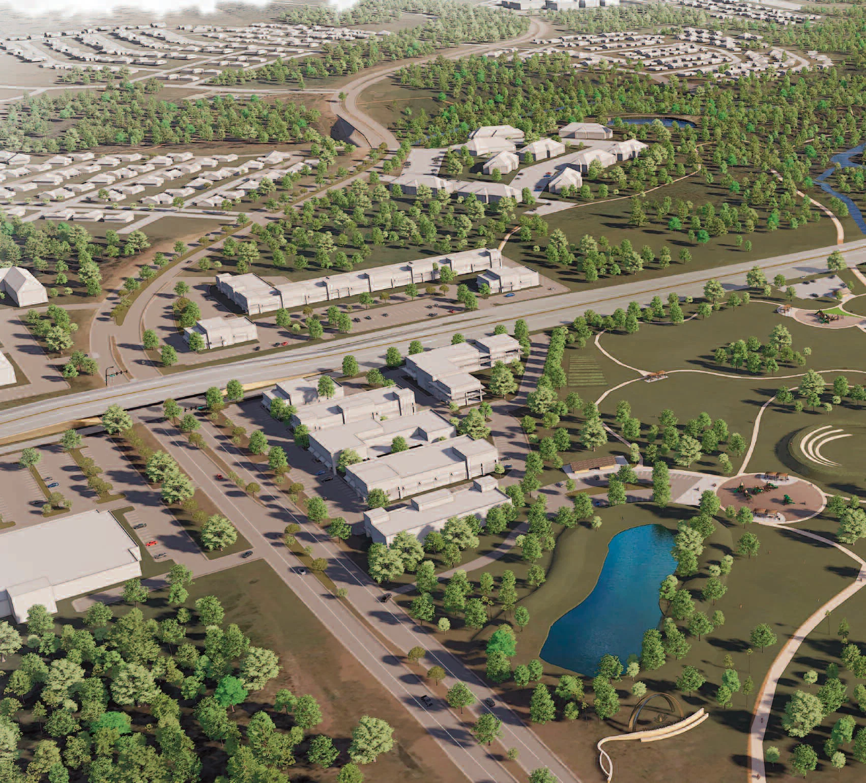 Aerial view of a planned community featuring residential units, green spaces, and a small pond.