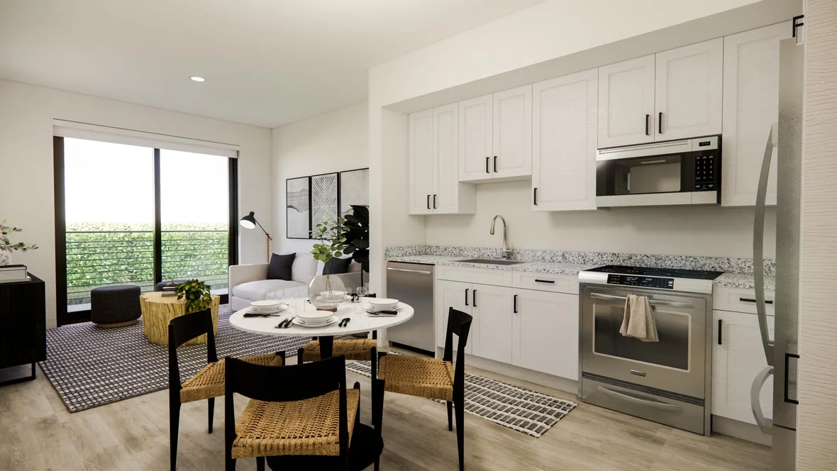 Stylish Modern Kitchen Interior A modern kitchen featuring white cabinets, a stainless steel stove, microwave, and a dining table with black chairs. Natural light comes through large windows with greenery visible outside.
