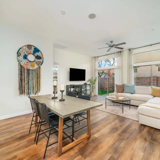 Open-concept kitchen and living area with natural light at Avilla Marana