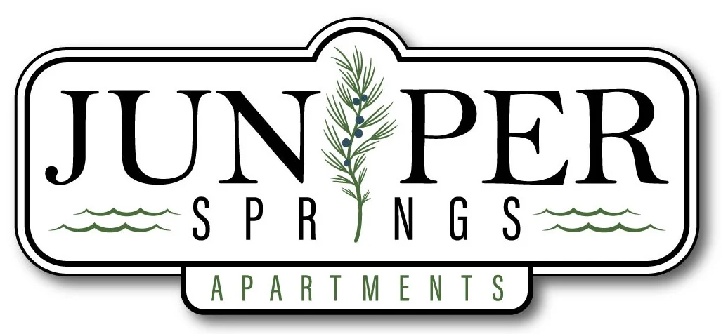 Juniper Springs Apartments Logo Logo for Juniper Springs Apartments featuring a botanical design and wavy accents.